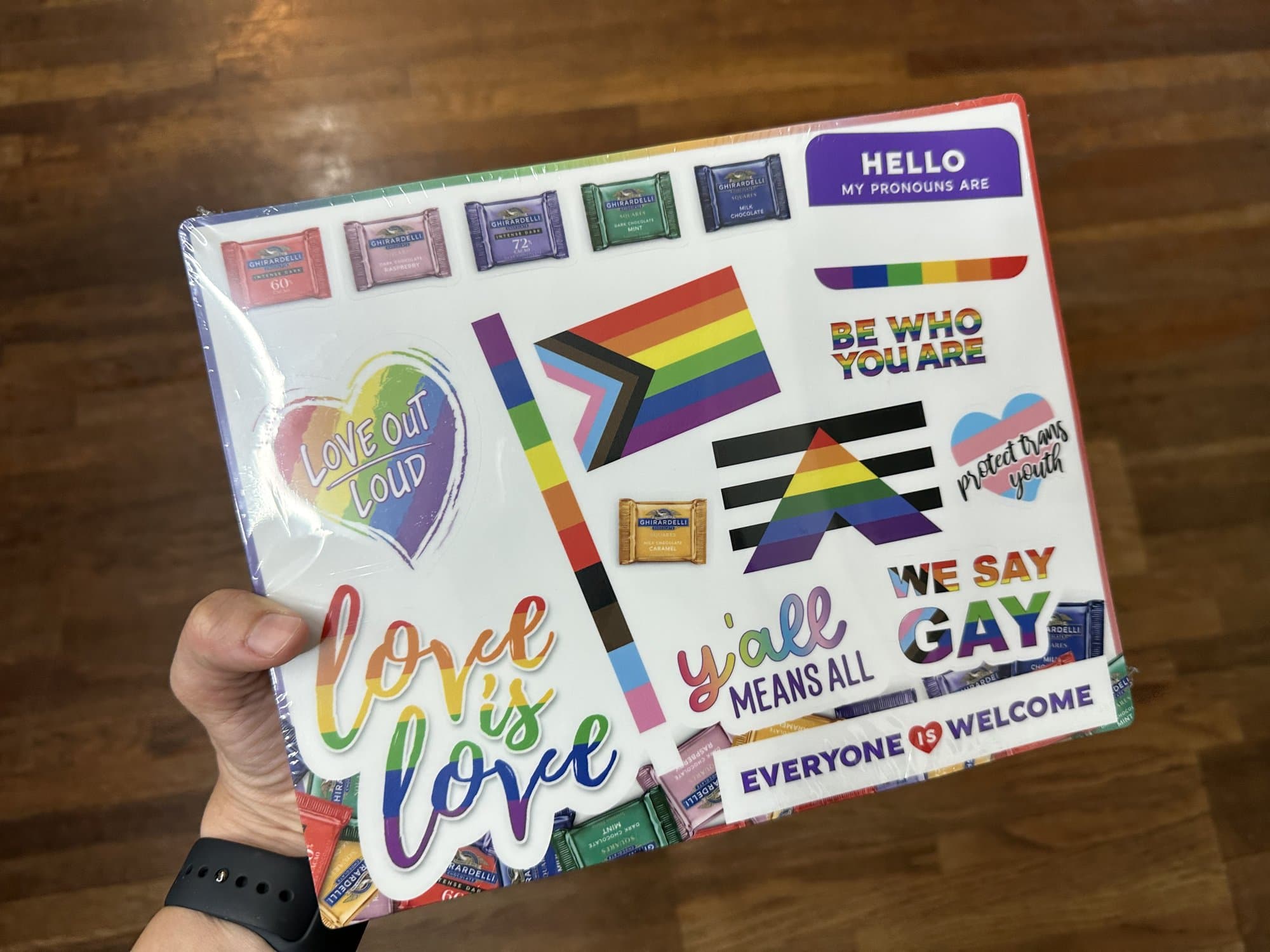 A Ghirardelli Pride sticker pack with chocolates, made for San Francisco Pride